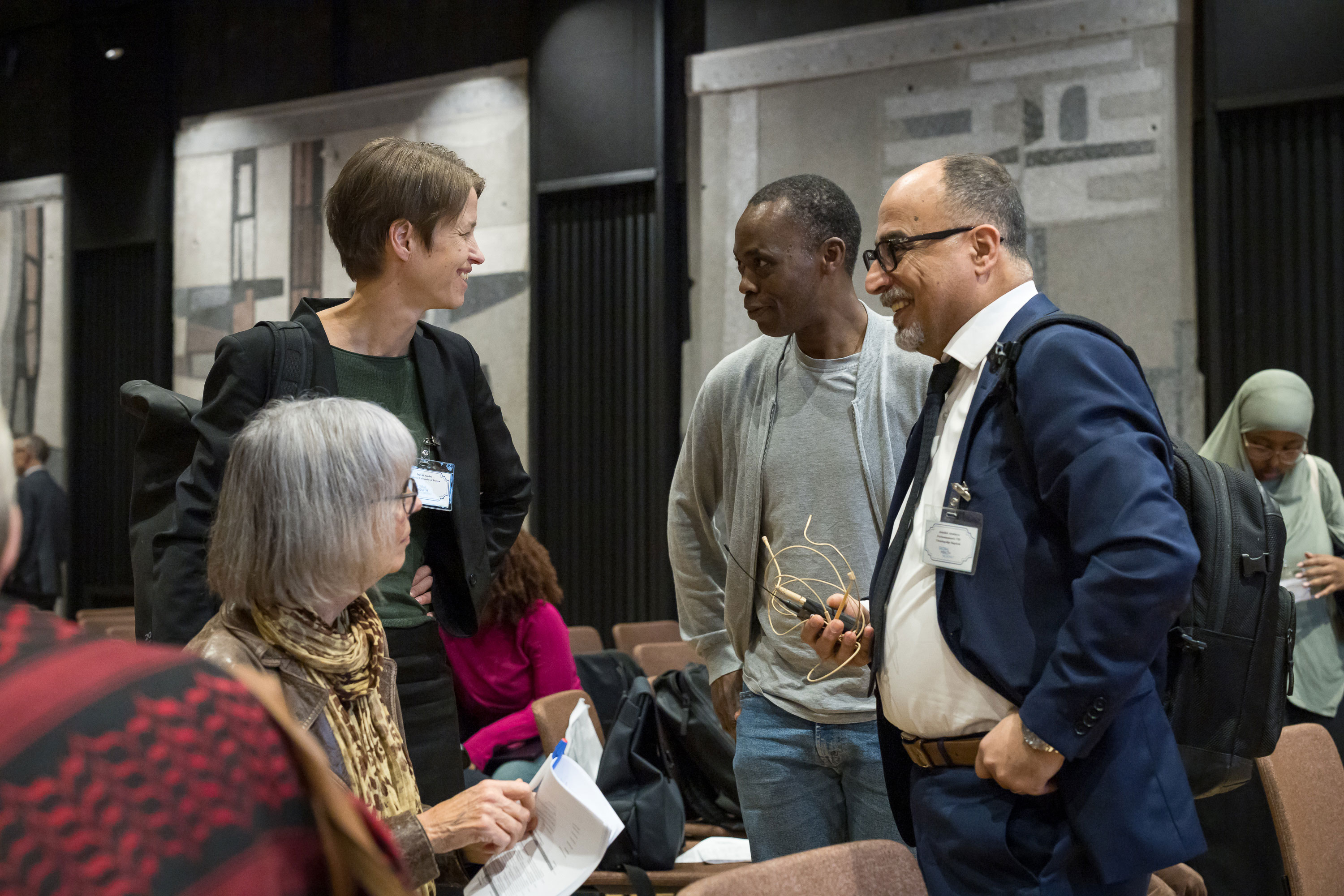 People at GHN-conference talking during break