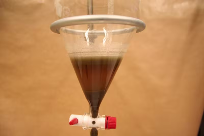 A hydrometer measures the density of LST before the heavy liquid is used.
