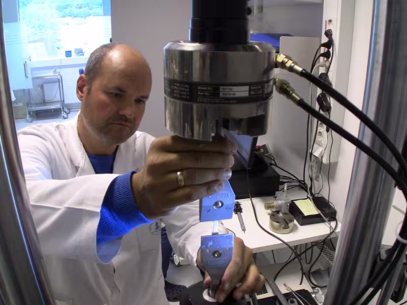 man using tensile test scaffold