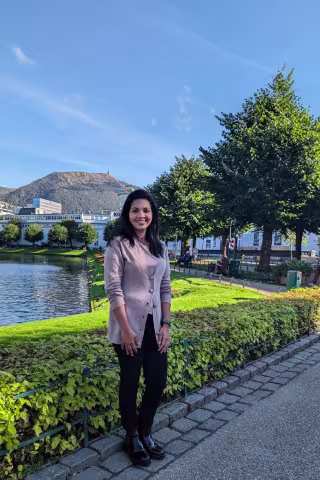 young woman smiling at camera in Bergen centre
