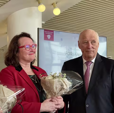 Prof. Eva Gerdts og HM Kong Harald