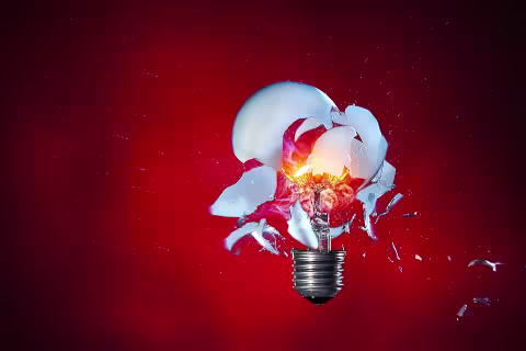 A photograph of an exploding lightbulb