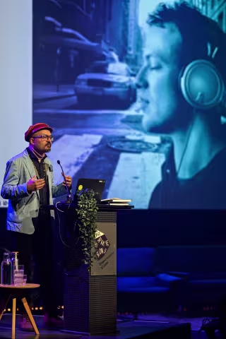 Budhaditya Chattopadhyay speaking at a festival