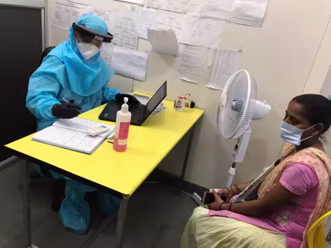 Physician in PPE at outreach clinic