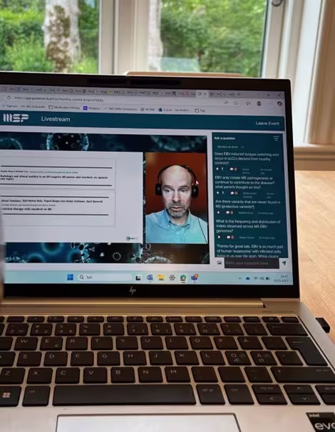 A laptop with an online meeting going on.