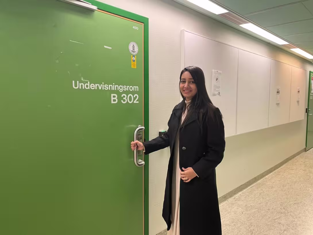 lady opening a green door